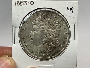 lot 104 image: 1883-O Morgan Silver Dollar