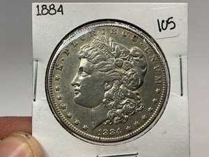 lot 105 image: 1884 Morgan Silver Dollar