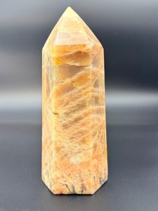 lot 3 image: A large regular moonstone generator tower featuring a smooth, creamy sheen with gentle pearlescent glow. 2 lbs 11.6 oz.  1.237 kg.