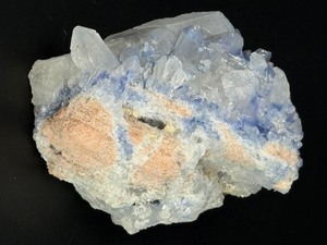 lot 8 image: Blue Halite Crystal is a translucent cluster of soft blue cubic formations, exuding a calm, cooling energy. 10.9 oz.  0.311 kg.