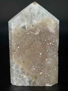 lot 12 image: A delicate druzy Golden Healer quartz tower sparkling with a natural crust of tiny crystals atop warm golden tones. Slender and radiant, it amplifies healing, light. 1lb 3.5 oz.  0.553 kg.