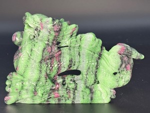 lot 20 image: A striking hand-carved dragon sculpted from natural ruby zoisite, showcasing vibrant green and deep red tones. 1 lb 8.6 oz.  0.699 kg.&nbsp
