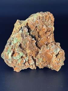 lot 25 image: A delicate carbonate mineral of zinc and copper, displaying soft hues of pale blue to greenblue in fine acicular (needlelike) crystal sprays or tufted clusters.1 lb.  0.454 kg.