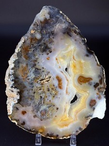 lot 27 image: An Agate Slice (Raw) showcases the natural beauty of agate in its most organic form.10.7 oz.  0.306 kg.