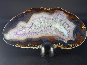 lot 37 image: Banded Amethyst Agate (Polished) is a stunning crystal piece that combines the deep, rich purples of amethyst with the layered, earthy tones of agate. 12.8 oz.  0.364 kg.