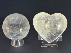 lot 43 image: Quartz Sphere and Quartz Heart with Inclusions are captivating crystal pieces that showcase the natural beauty and energetic depth of quartz.1 lb 4.9 oz.  0.594 kg.