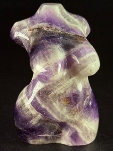 lot 72 image: Divine Feminine Amethyst Chevron is a beautifully patterned crystal that combines the deep purple of amethyst with milky white quartz in distinctive V-shaped chevron banding. 5,8 oz.  0.166 kg.