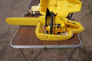 lot 61 image: McCulloch Eager Beaver Chain Saw With Case
