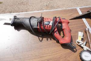lot 63 image: Skil Brand Sawzall