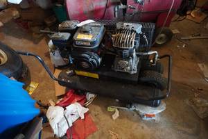 lot 6 image: Robin 6 hp Contractors Job Site Wheel Barrow Air Compressor