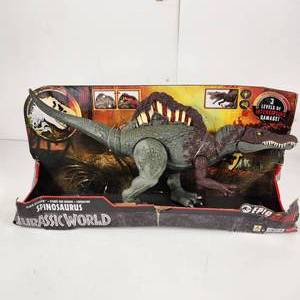 lot 22 image: Jurassic World Spinosaurus Slice Attacking Lights Up Sound New Damaged Box