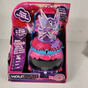 lot 31 image: New HoloBrite Pixie Over 200 Ways To Play With Your Virtual Friend Games Earn Points Every Time She Visits