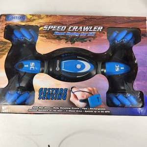 lot 36 image: New Speed Crawler Stunt Racing Car SC1 Gesture Sensing Remote Control From Contixo