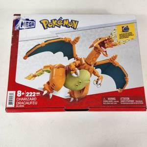 lot 40 image: Mega Pokemon Charizard Includes Poke Ball Pin NEW