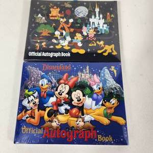 lot 62 image: Lot Of Two New Disney World Disney Land Autograph Books