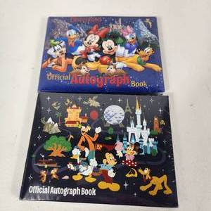 lot 63 image: Lot Of Two New Disney World Disney Land Autograph Books