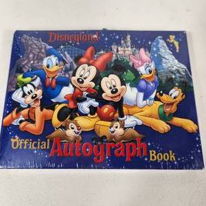 lot 65 image: One New Disney Land Autograph Book Blue