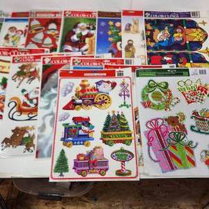 lot 82 image: Lot Of Thirteen Christmas Window Clings Most Are New There May Be A Few Used Great Condition