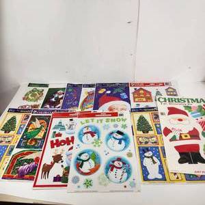 lot 84 image: Lot Of Twelve Christmas Window ClingsDecorating KitNew Years One Is Used Great Condition