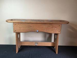 lot 29 image: Wooden Bench with Checkerboard Design and Heart Cutouts