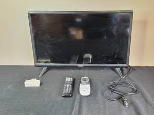 lot 31 image: Vizio 24-Inch LED TV with Remotes and Power Adapter