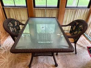 lot 56 image: Glass Top Outdoor Dining Set with Wicker Chairs - 3 Pieces