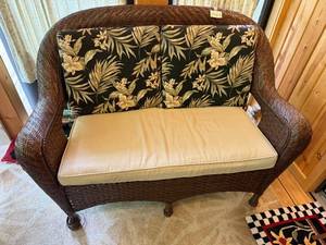 lot 97 image: Wicker Loveseat with Floral Cushions