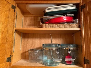 lot 110 image: Kitchenware Set with Baking Trays, Glass Canisters, and Strainer
