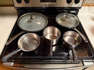 lot 125 image: Bialetti Stainless Steel Cookware Set with Lids
