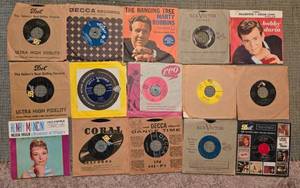 lot 146 image: Collection of Vintage Vinyl Records with Original Sleeves