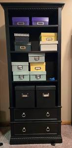 lot 166 image: Black Tall Bookcase with Storage and Assorted Colored Boxes