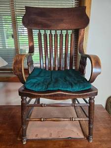 lot 180 image: Wooden Chair with Armrests and Green Seat Cushion