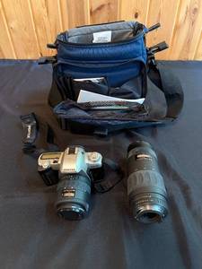 lot 256 image: Pentax ZX-50 SLR Camera with 35-80mm and 100-300mm Lenses Set