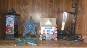 lot 282 image: Assorted Decorative Items Nativity Lantern, Gas Station Miniature, Stars, and Candle Holder
