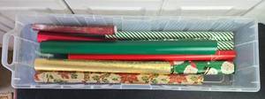 lot 303 image: Assorted Christmas Wrapping Paper Rolls with Storage Box - paper quantities unverified