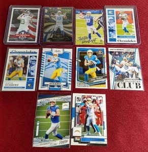 lot 61 image: (10) Justin Herbert Cards - (4) Rookies