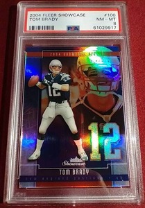 lot 132 image: 2004 Fleer Showcase Tom Brady - PSA 8