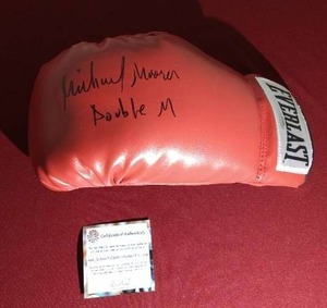 lot 171 image: Michael Moorer Autographed Everlast Boxing Glove WCOA