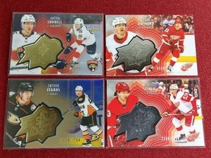 lot 249 image: (4) Numbered 2021-22 Upper Deck Hockey Cards