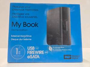 lot 113 image: Brand New MY BOOK 1TB External Hard Drive