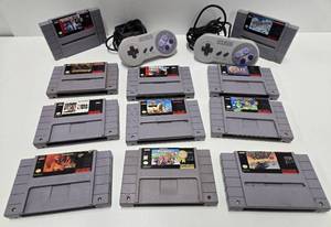 lot 117 image: Group of Super Nintendo SNES Video Games & 2 Controllers