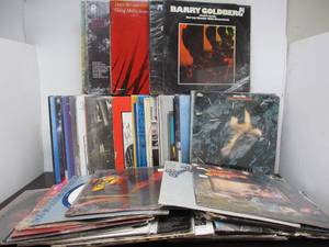 lot 182 image: Large Lot of Vintage Vinyl Records - Most Sealed or in Shrink - ALL Have Water Damage