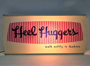 lot 371 image: Vintage Early 70s HEEL HUGGERS Lighted Shoe Store Advertising Sign