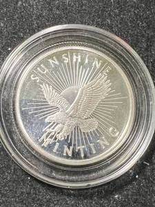 lot 12 image: 1 TROY OZ .999 FINE SILVER SUNSHINE MINT ROUND IN AIRTITE