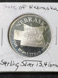 lot 16 image: 13.4 GRAMS OF .925 STERLING SILVER NEBRASKA ROUND