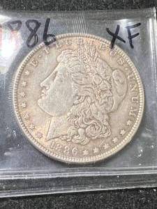 lot 23 image: 1886 US MORGAN SILVER DOLLAR XF