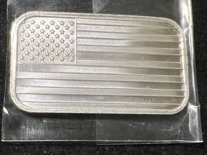 lot 28 image: 1 TROY OZ .999 FINE SILVER AMERICAN FLAG BAR