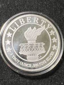 lot 29 image: 1 TROY OZ .999 FINE SILVER LIBERTY ROUND IN AIRTITE