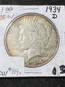 lot 76 image: 1934-D US PEACE SILVER DOLLAR AU