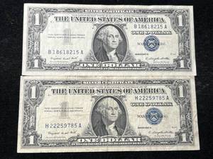 lot 100 image: 2 US 1957A BLUE SEAL $1 SILVER CERTIFICATES